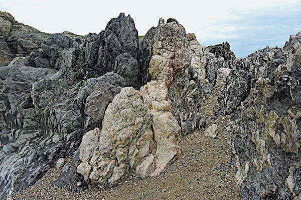 Melange far end of Llanddwyn Island